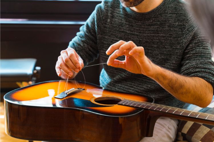 How To Replace Strings on an Acoustic Guitar